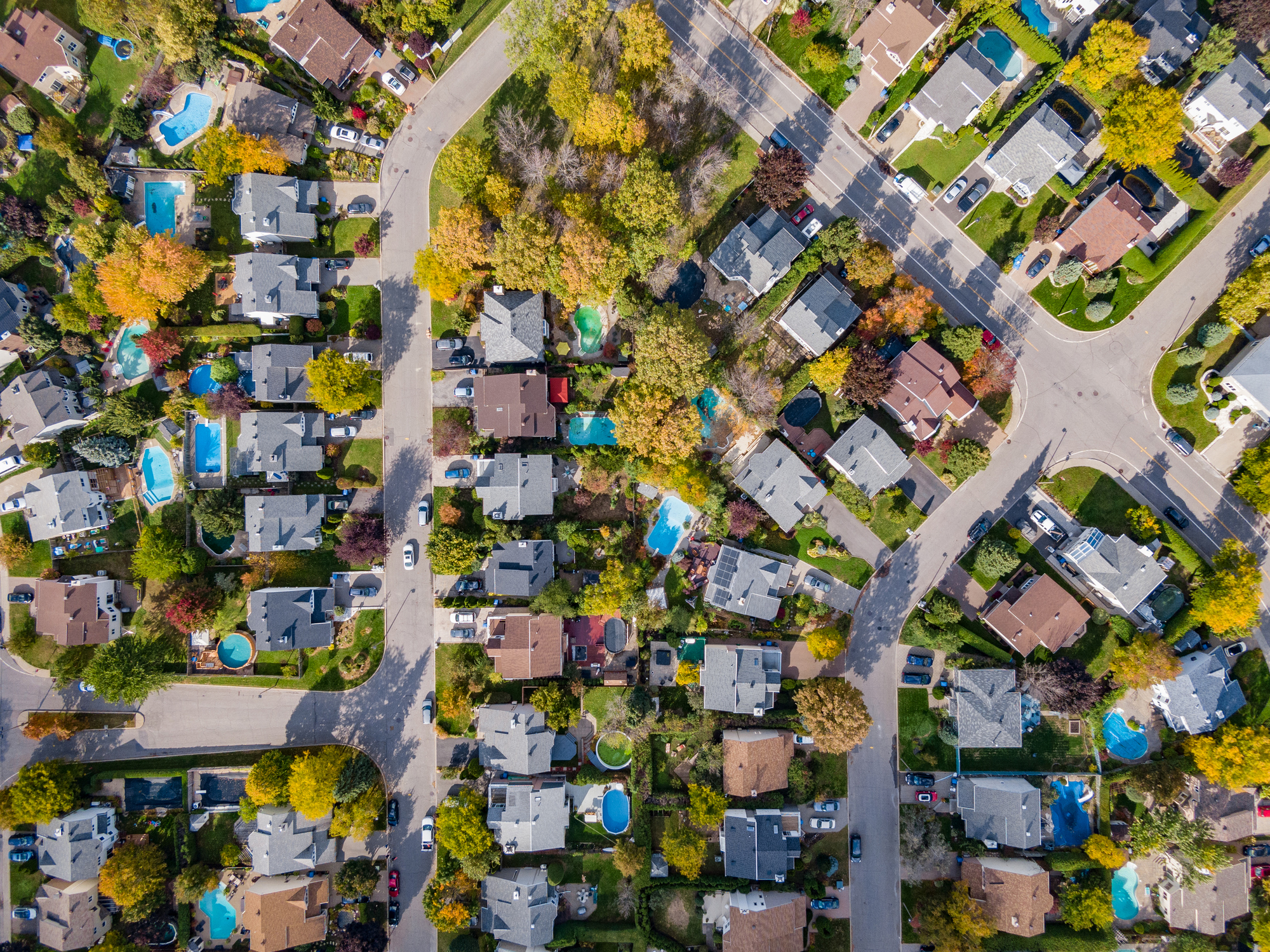 Aerial view of SGV neighborhood with pools